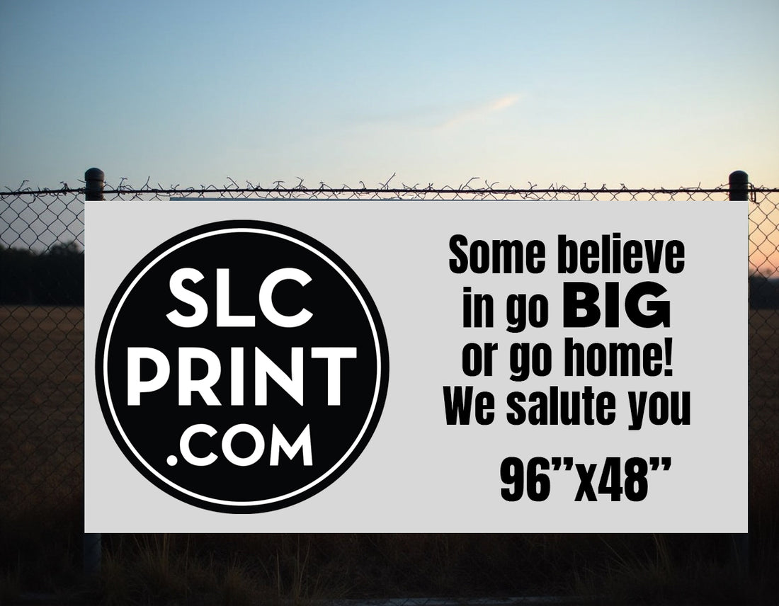 A picture of a 8x4 correx sign attached to a chain link fence, it has a logo and some words that say some believe in go big or go home! we salute you