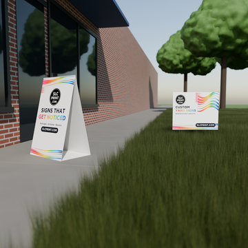 Small Business Sign Package: an SLC Print corrugated A-frame sign on the sidewalk outside a shop and a 22x18 corrugated lawn sign on a step stake in the grass